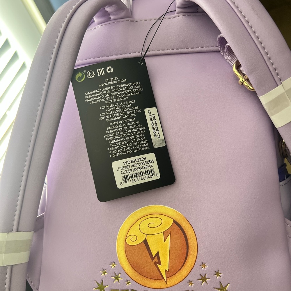 Loungefly Disney Hercules Muses Backpack with Purple and Cream - Picture 3 of 3